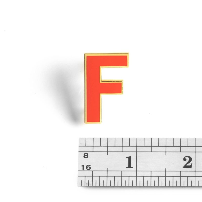 F Pin with ruler on white